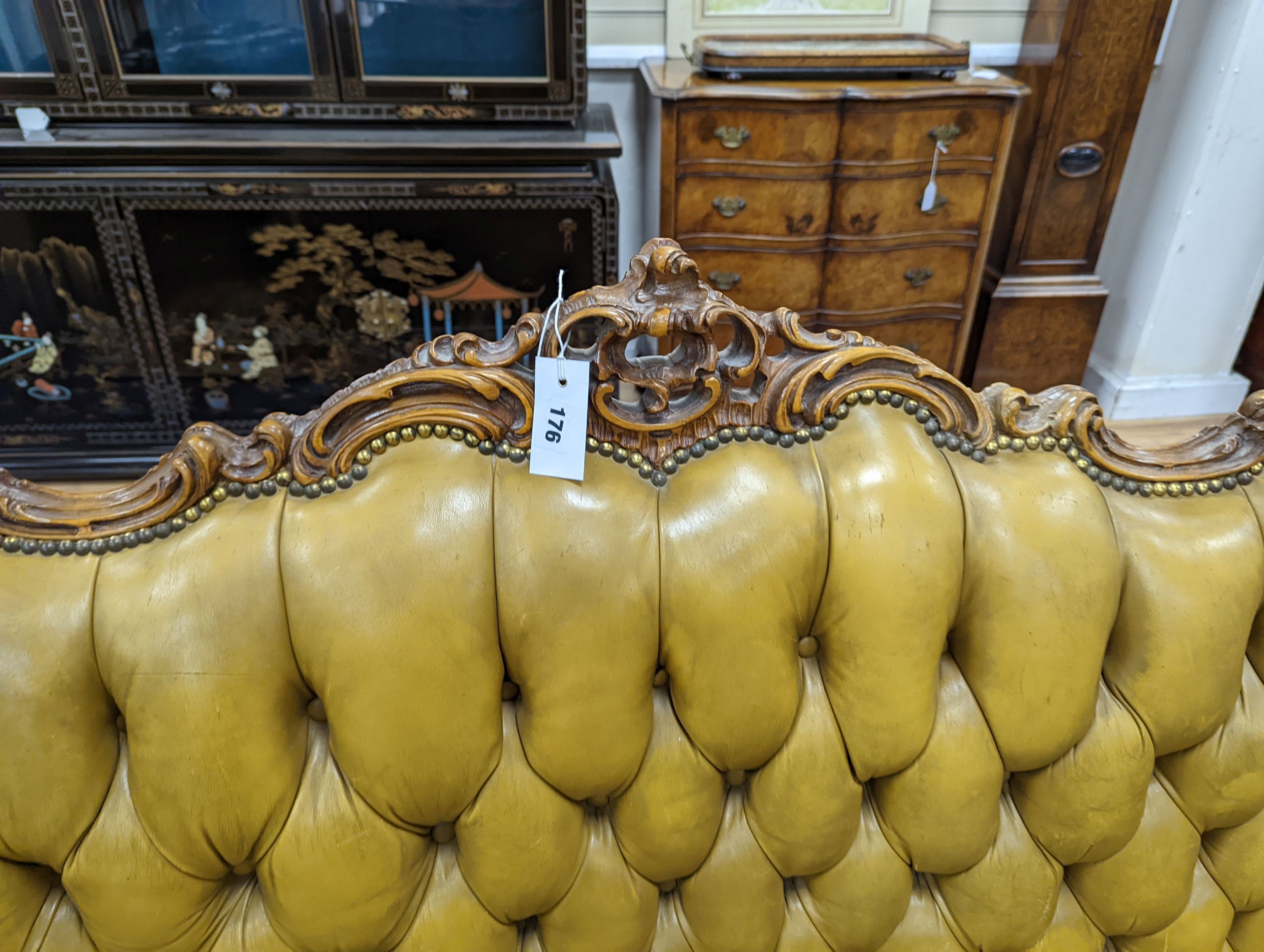 A Louis XVI design settee upholstered in buttoned olive leather, length 190cm, depth 70cm, height 99cm